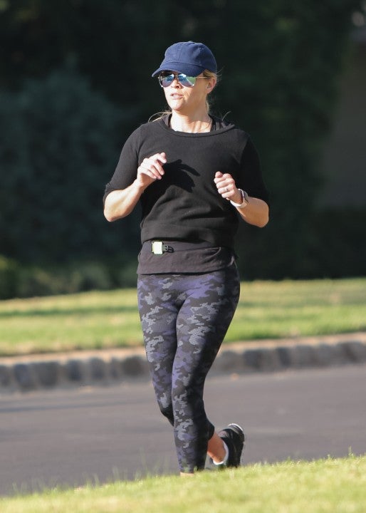 Reese Witherspoon jogs in Los Angeles