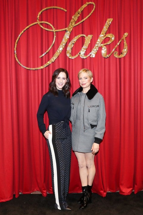 Rachel Brosnahan and Michelle Williams at saks holiday light show