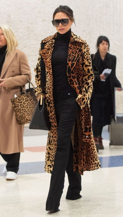 Viotoria Beckham in leopard coat at JFK
