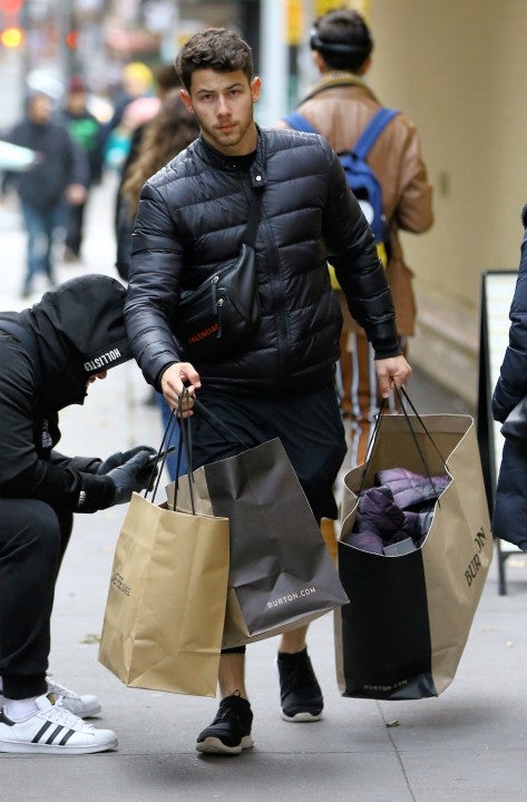 Nick Jonas goes shopping at Burton in Soho