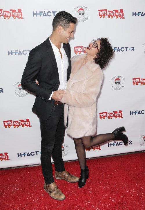 Wells Adams and Sarah Hyland at 6th annual Winter Wonderland Toys for Tots Party 