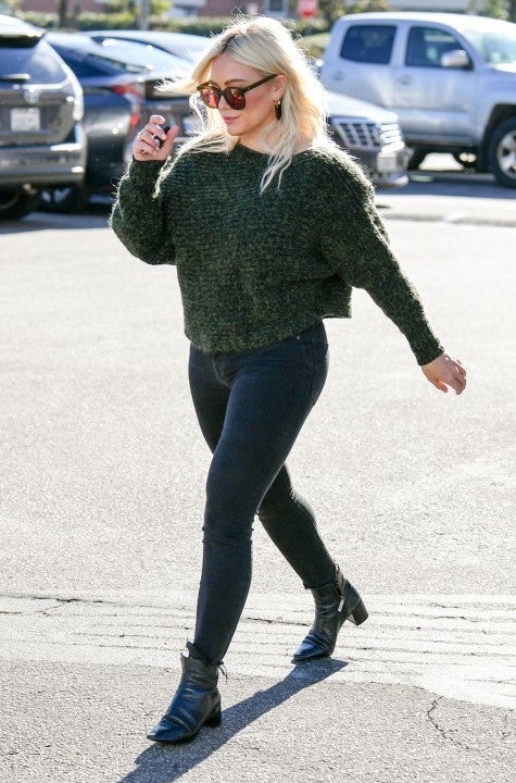 Hilary Duff in green sweater in LA