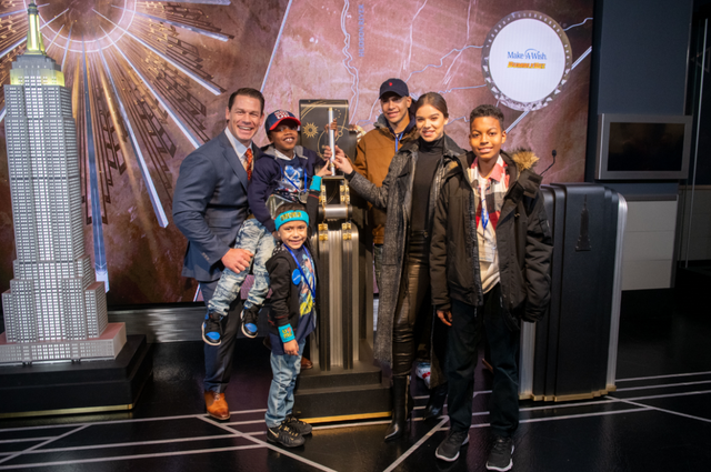 John cena and Hailee steinfeld with makeawish kids at empire state building