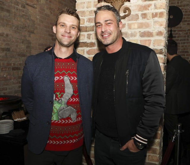 Jesse Spencer and Taylor Kinney at One Chicago holiday party