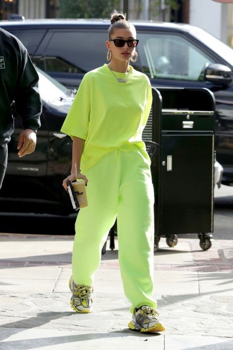 Hailey Baldwin at hair appt in neon outfit