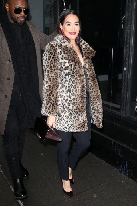 Brie Bella in leopard print coat