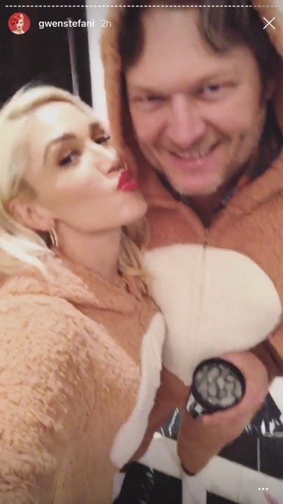 Gwen Stefani and Blake Shelton in reindeer onesies