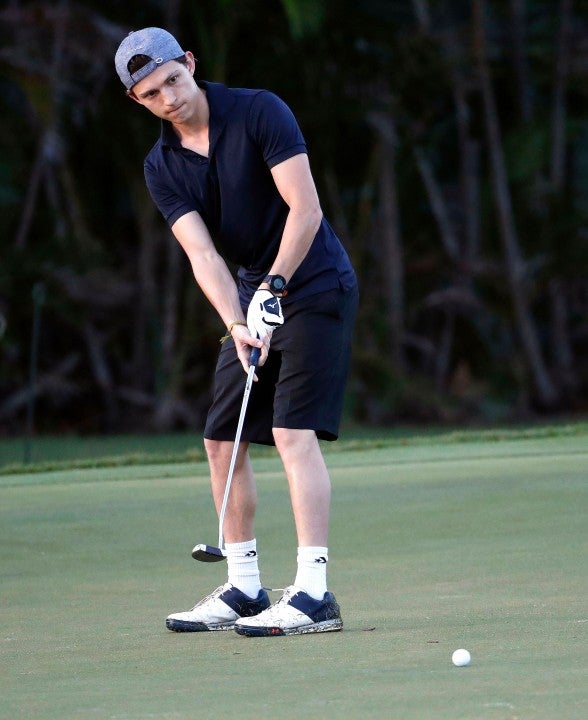 Tom Holland golfing in Hawaii