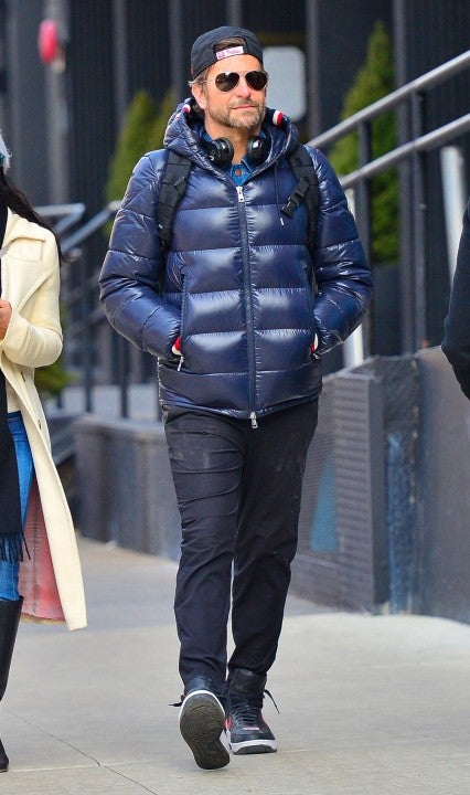 Bradley Cooper walks in nyc with female companion