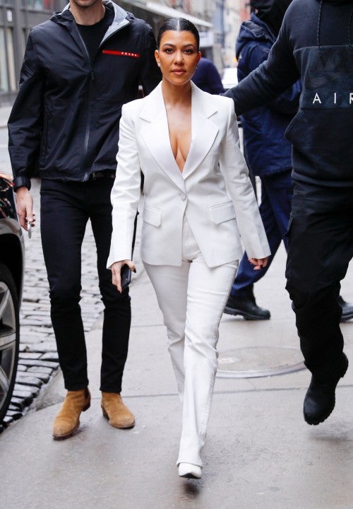 Kourtney Kardashian in white suit in nyc