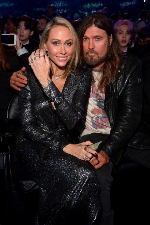 Tish and Billy Ray Cyrus inside 2019 grammys