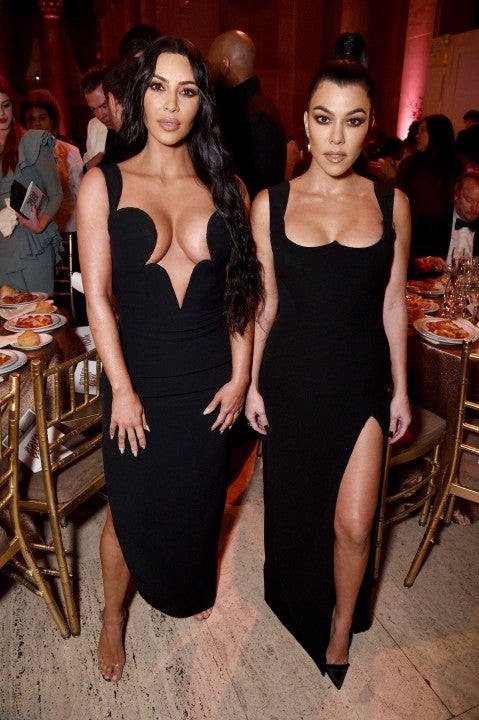 Kim Kardashian West and Kourtney Kardashian at amfar gala