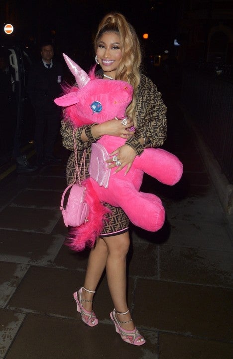 Nicki Minaj with pink unicorn at london club
