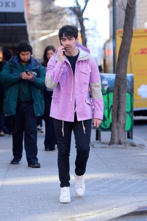 Joe Jonas in pink coat in nyc