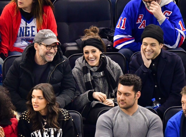 Christian Slater, Carly Chaikin and Rami Malek at rangers game
