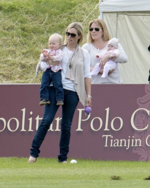 Zara Tindall and Autumn Phillips in june 2012 with their daughters