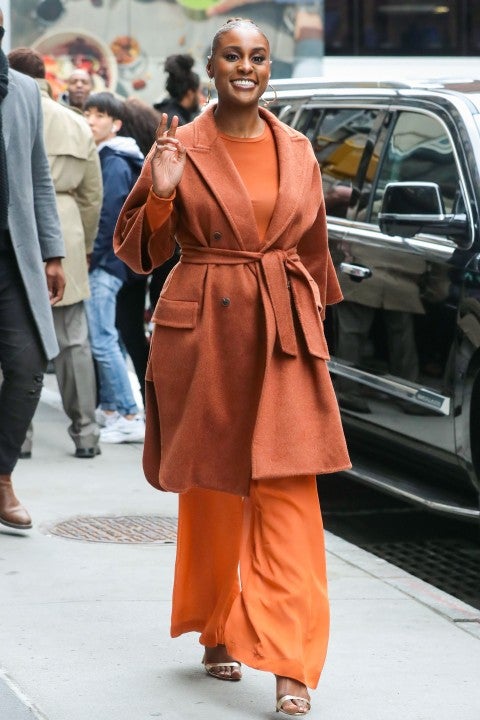 Issa Rae in orange outfit in nyc