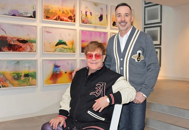 Elton John and David Furnish on April 16 at home