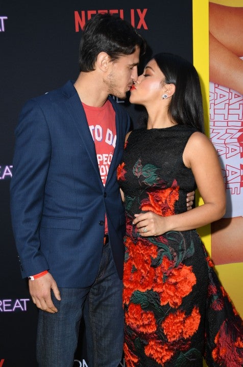Gina Rodriguez and fiance at someone great premiere