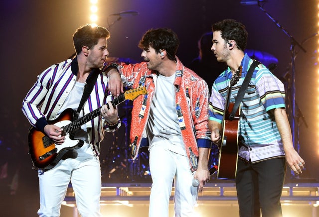 The Jonas Brothers perform at march madness