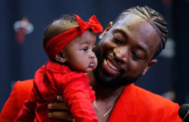 Dwyane Wade with daughter Kaavia at last miami heat game