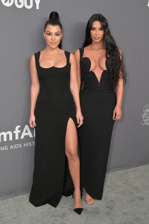 Kourtney and Kim Kardashian at the 2019 amfAR New York Gala