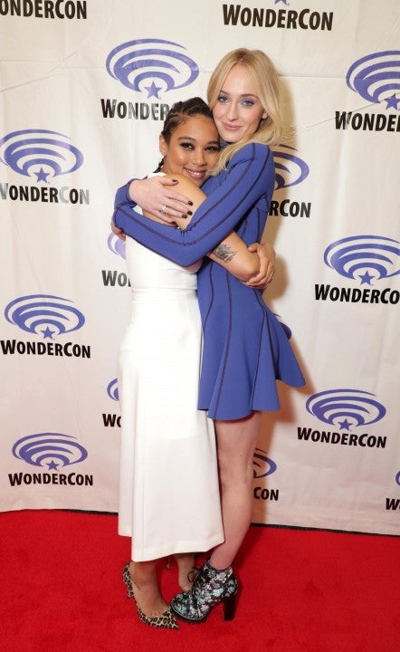 Alexandra Shipp and Sophie Turner at wondercon in anaheim