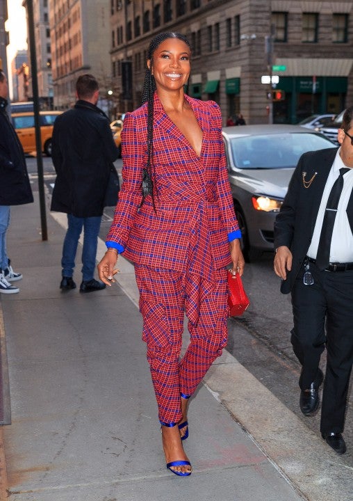 Gabrielle Union leaves nyc hotel in red and blue plaid suit