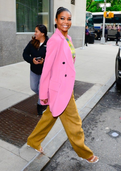 Gabrielle Union in pink jacket in NYC on May 14
