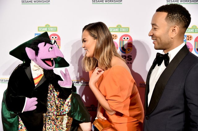 Chrissy Teigen and John Legend with Count Dracula
