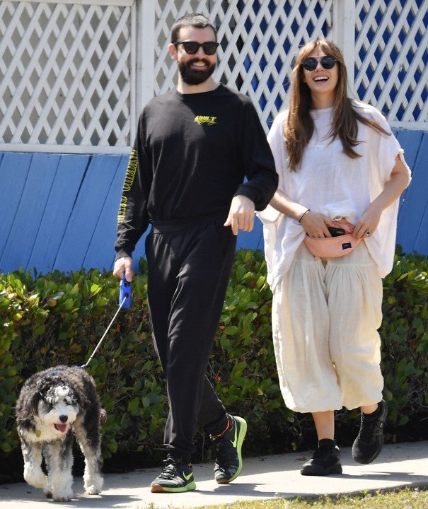 Elizabeth Olsen and boyfriend walking dog on Mother's Day