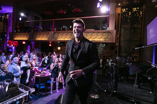 Robin Thicke performs at ronda's kiss good fortune gala