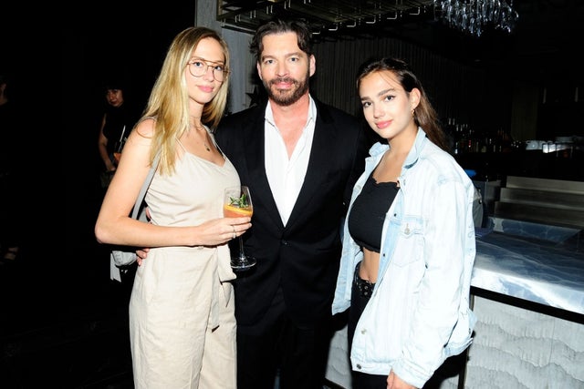 Harry Connick Jr and daughters at pavarotti afterparty