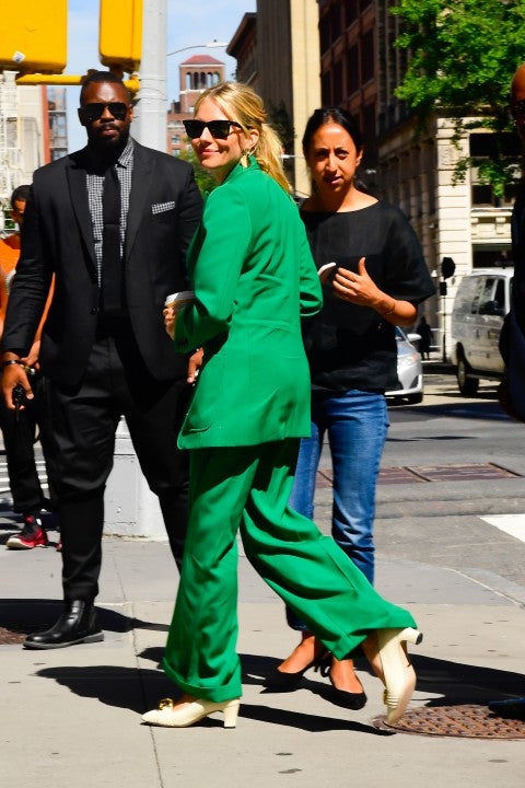 Sienna Miller in green suit in nyc