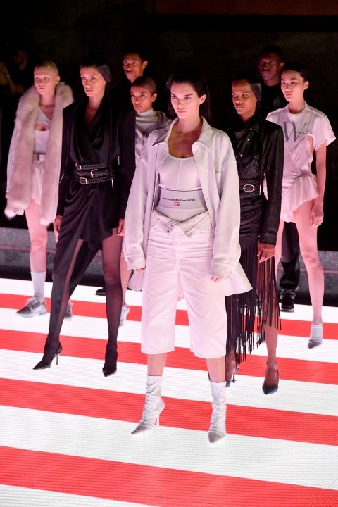 Kendall Jenner and models pose on the runway during the Alexander Wang Collection 1 fashion show 