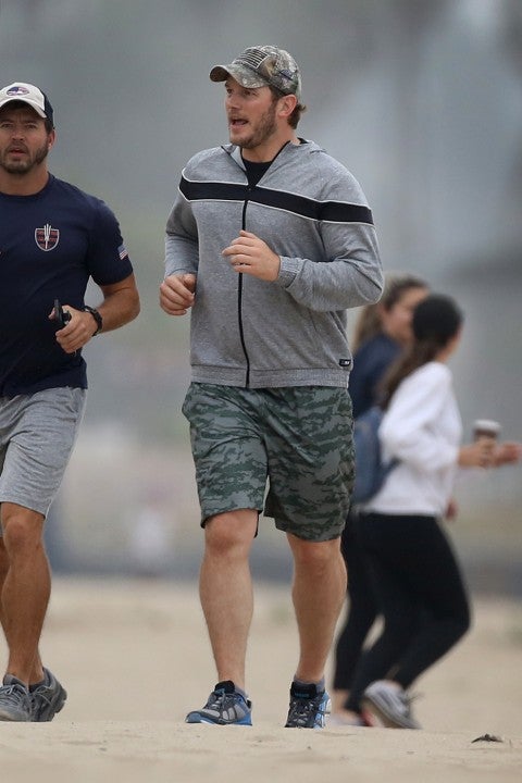 Chris Pratt runs on beach in Venice