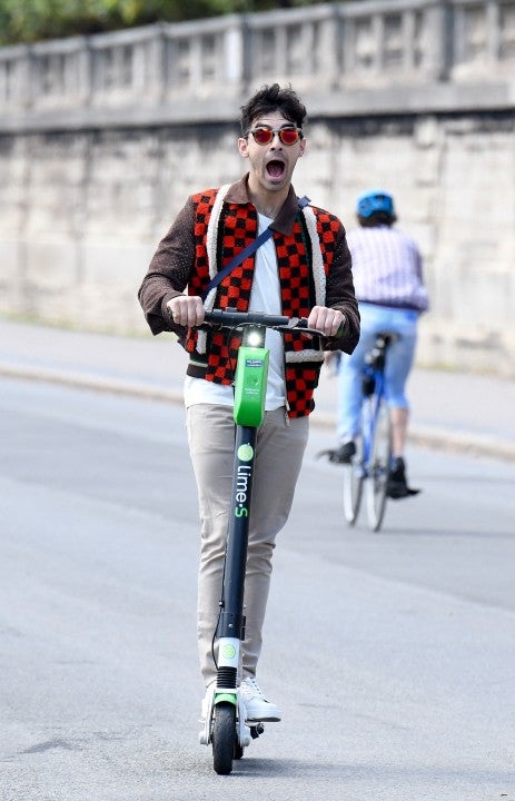 Joe Jonas on scooter in paris
