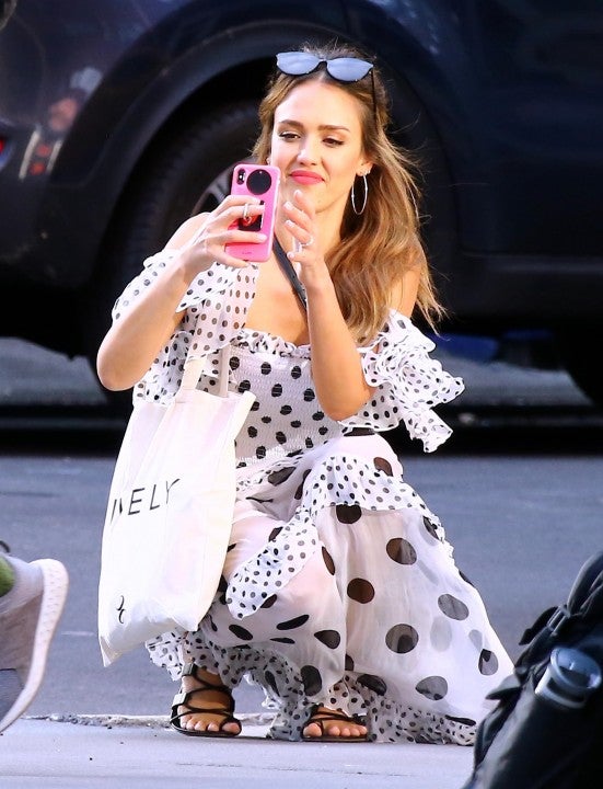 Jessica Alba takes pic in polka dot dress in nyc