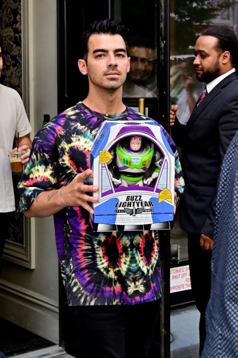 Joe Jonas with Buzz Lightyear in NYC