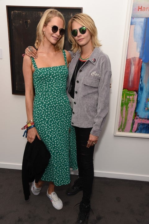 Poppy and Cara Delevingne at Teen Cancer America Suite at Bob Dylan and Neil Young in Hyde Park on July 12, 2019 in London, England. (Photo by 