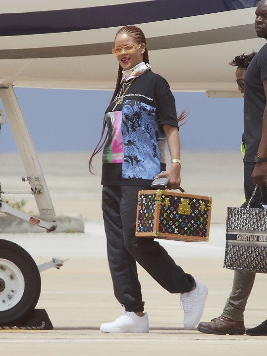 Rihanna wears immigrant tee as she lands in barbados