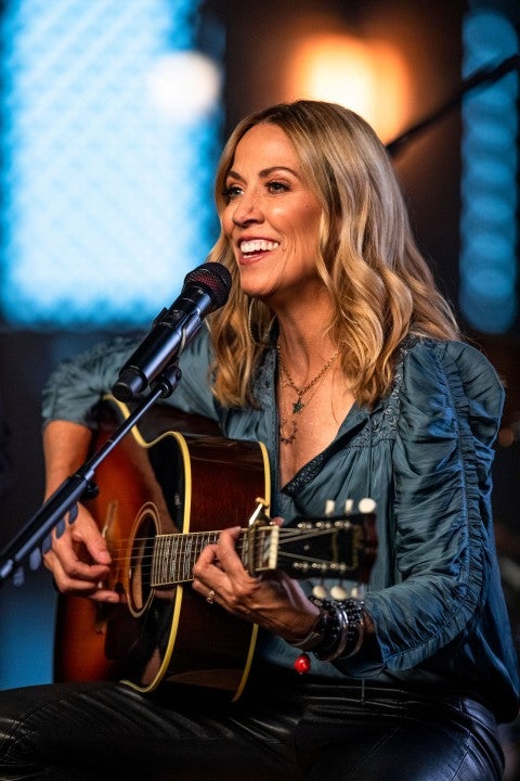 Sheryl Crow performs with Emmylou Harris during CMT Crossroads