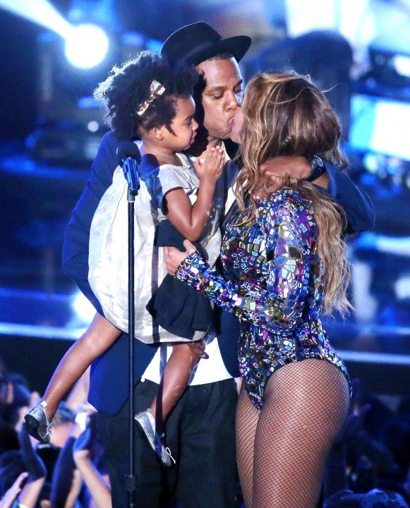 Blue Ivy Carter, Jay Z and Beyonce onstage during the 2014 MTV Video Music Awards 