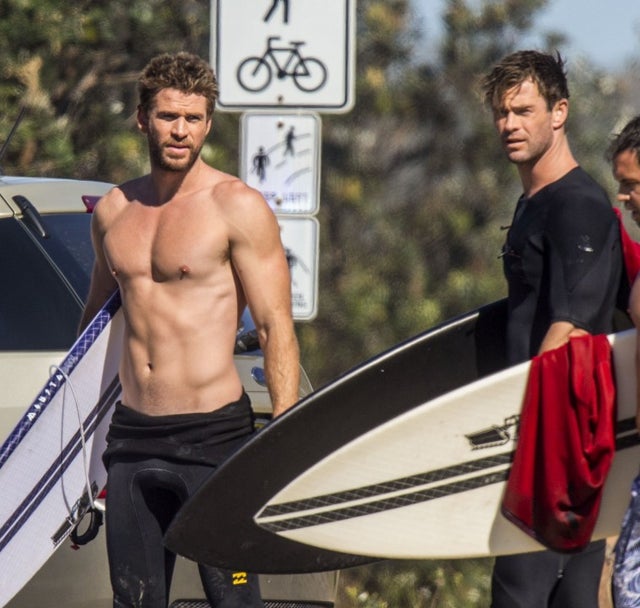 Liam Hemsworth and Chris hemsworth in byron bay shirtless