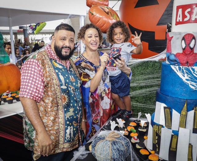 DJ Khaled, Nicole Tuck and Asahd Khaled sing happy birthday during Asahd Khaled's 3rd Birthday Halloween Bazaar