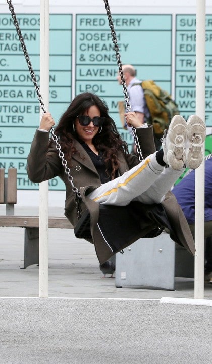 Camila Cabello on swing in london