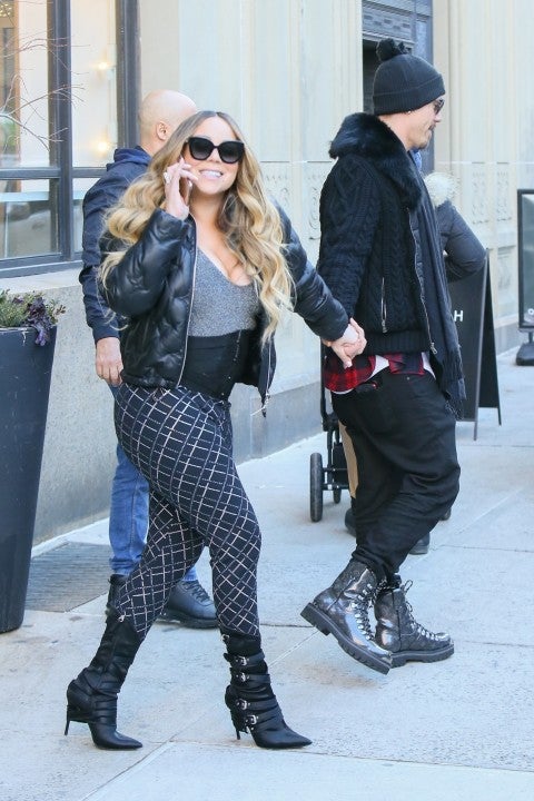 Mariah Carey holding hands with BF