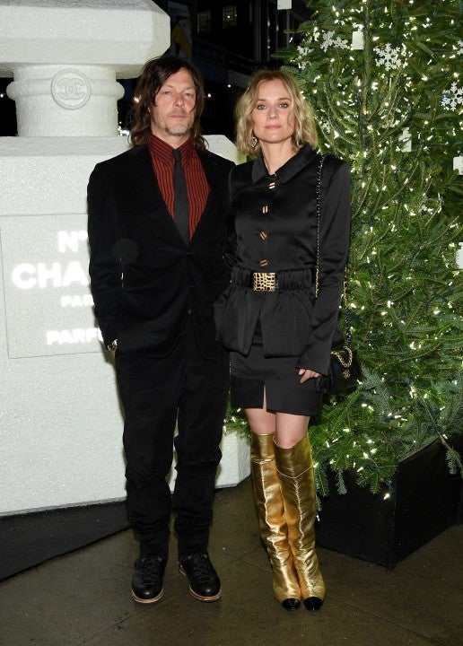 Norman Reedus and Diane Kruger at chanel holiday party