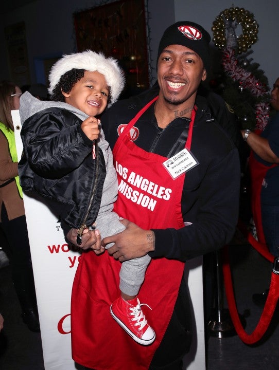 Nick Cannon and son Golden Cannon at Christmas Celebration On Skid Row