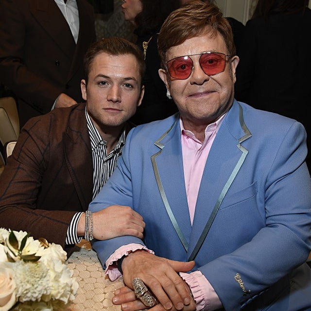 Taron Egerton and Elton John at bafta tea party